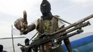 Militants wearing black masks patrol the creeks of the Niger Delta area of Nigeria. (File photo)