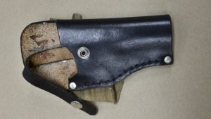 Police also released a photo of a gun holster they say was Mr Scott's