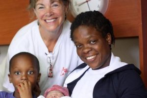 MSF midwife Jonquil Nicholl, Faith Oqunbor and baby Newman Otas